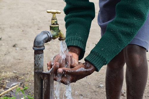 Dienda calls for water debt write off