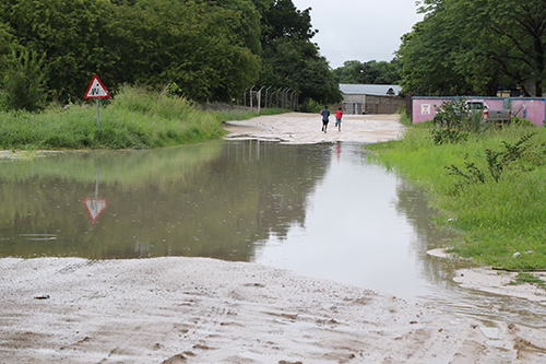 Residents stranded as torrential rains flood roads
