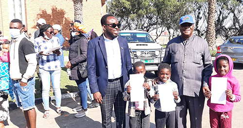 Fire victims receive national documents