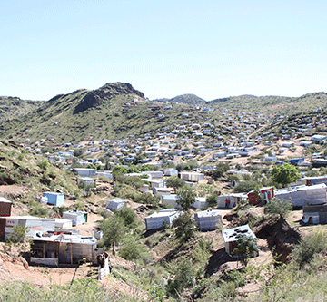 Mushrooming shacks delay city development