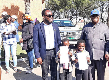 Fire victims receive national documents