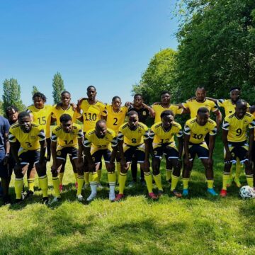 Namibian Sheriff rides on the crest of the UK waves…pitchside with Ronnie ‘Jaly’ Kamaundju