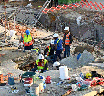 SA rescuers in contact with 11 trapped in collapsed building