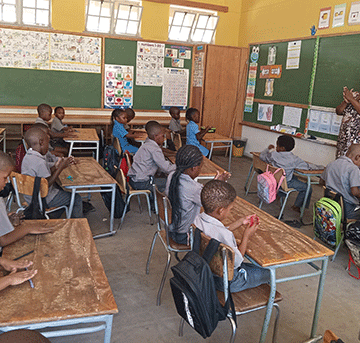 battle //Kharas schools face uphill battle