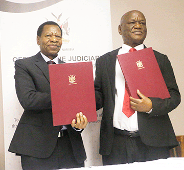 Nam, Zim judiciaries  ink pact