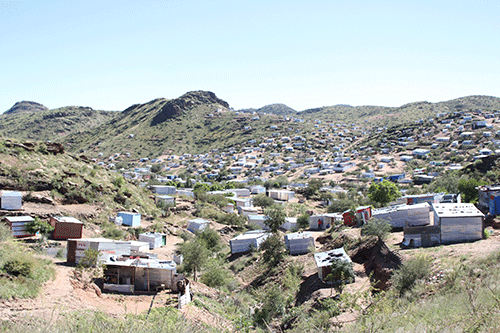 Mushrooming shacks delay city development