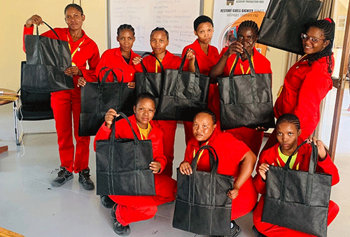 San women trained to produce clothing