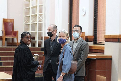 Gay partner’s residency up for review