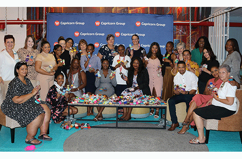 Capricorn staff  hand out 250 dolls