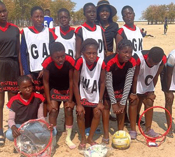 donation Alumni donate sports equipment to school