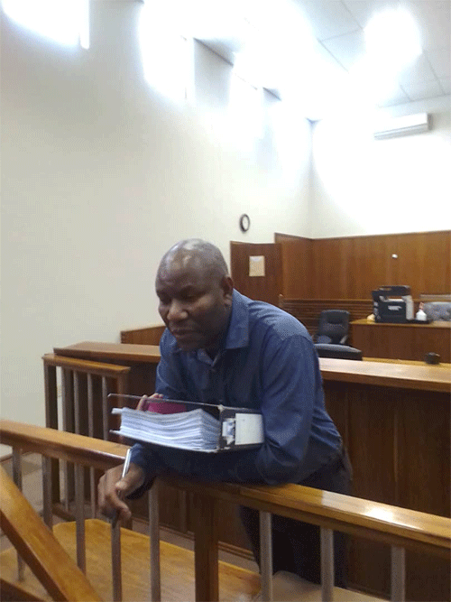 Accused killer teacher suffers blow