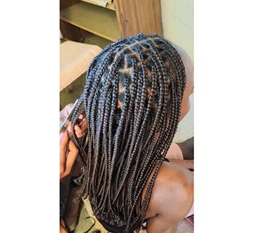 hair braider3 Tjerivanga: Navigating the world of studies, business