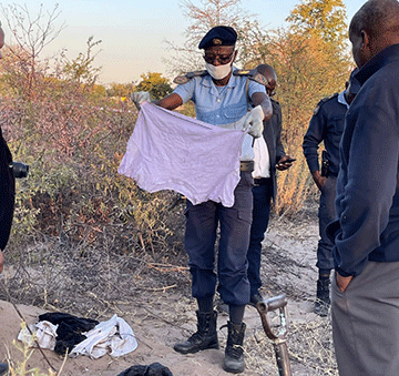 Police discover lung, clothes in shallow grave