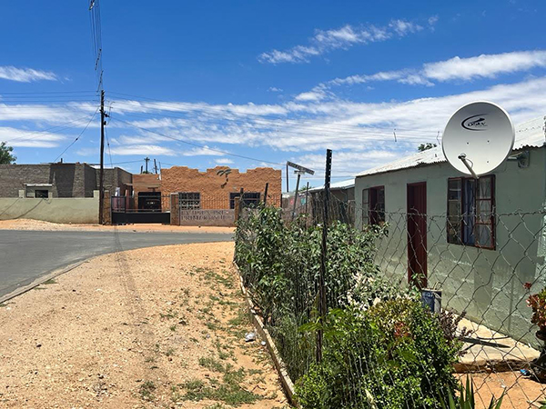 Woman wins back dubiously sold house
