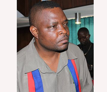 unmasked Councillor unmasked for defaulting on campaign material