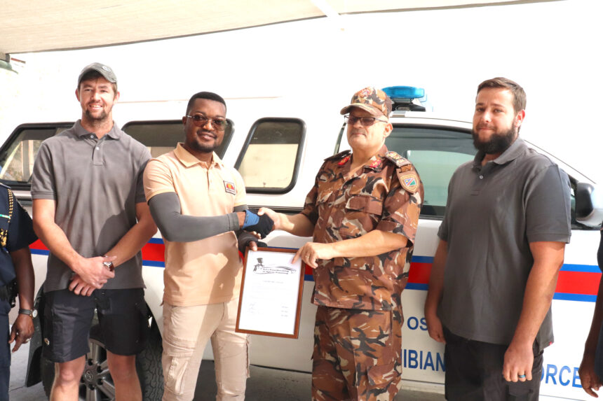 Panelbeaters repair police vehicle