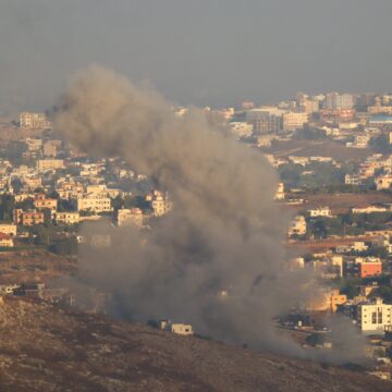 Israel warns Lebanese as wave of strikes hits Hezbollah