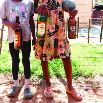 Minors sell bottles for survival 