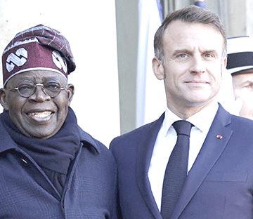 Nigerian president welcomed in France in first visit since 2000 