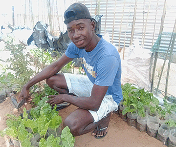 Backyard gardener walks food self-sufficiency talk