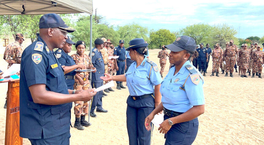 Police climb ladder in Kavango East