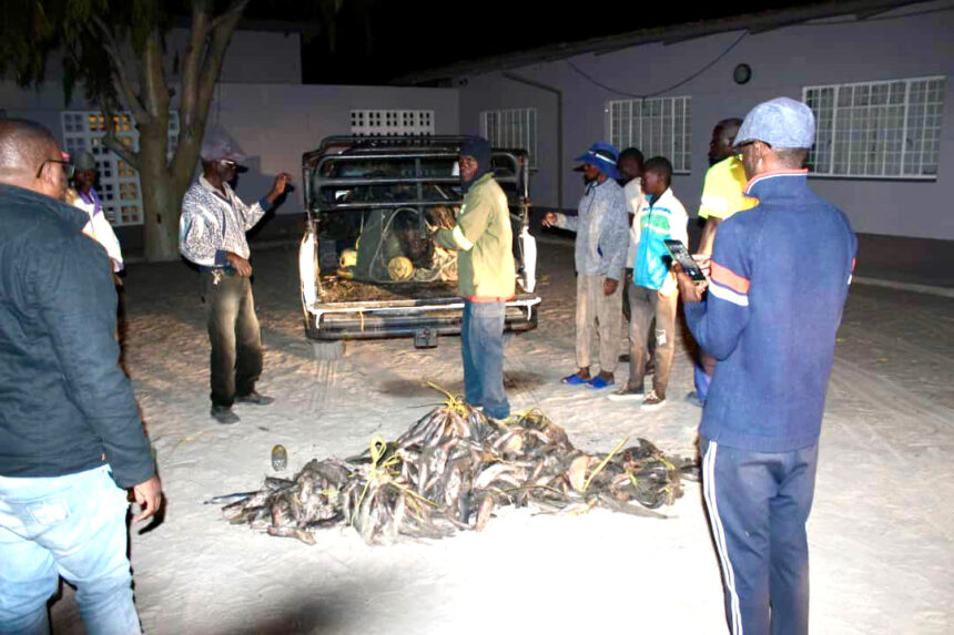 Residents fish in sewage pond