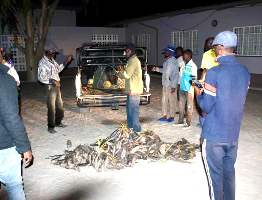 Sewerage Fishing Residents fish in sewage pond