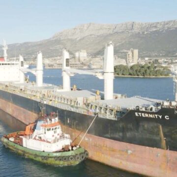Damaged ship under fire in Red Sea 