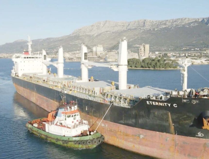 Damaged ship under fire in Red Sea 