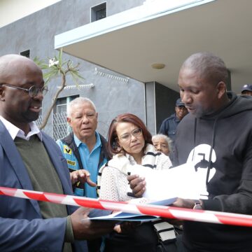 Heather Erdmann_CoW petition handover (2) City pensioners demand debt relief …want pre-paid meters