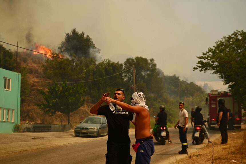 Thousands battle Greece fires as heatwave bakes Europe
