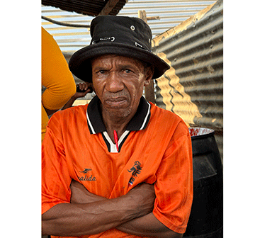 IMG_0455 Father left to care for 7 orphaned grandchildren