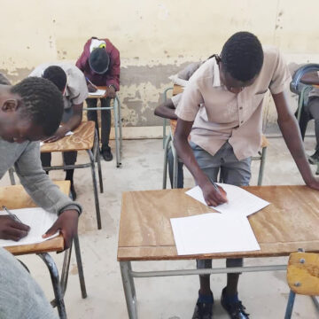 Katjinakatji learners write final exams while standing 