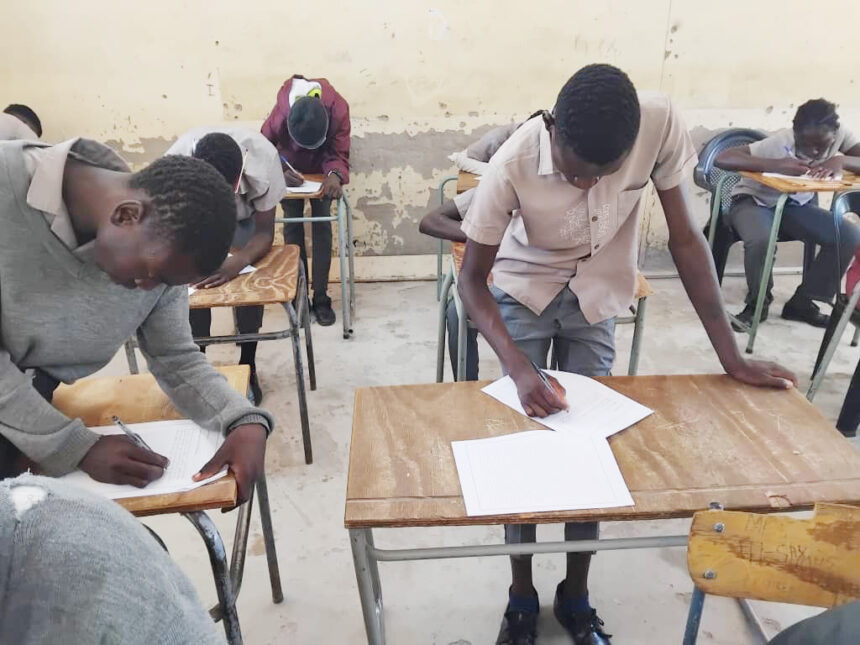 Katjinakatji learners write final exams while standing 