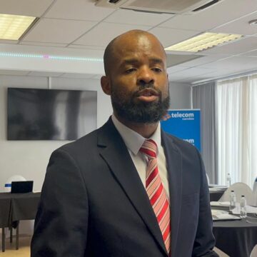 Telecom seeks to reset ties with government