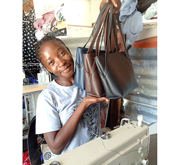 Bag-making1 All in a day’s work …Silas builds a life through bag-making