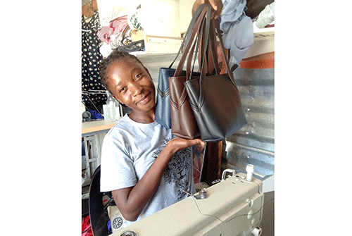 Bag-making1 All in a day’s work …Silas builds a life through bag-making
