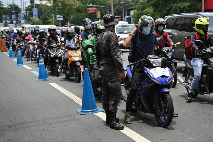 PHILIPPINES-HEALTH-VIRUS Philippines orders millions to stay home … as global virus cases soar