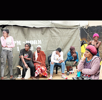 Sankwasa takes aim at land grabs … talks fire victims out of rebuilding shacks