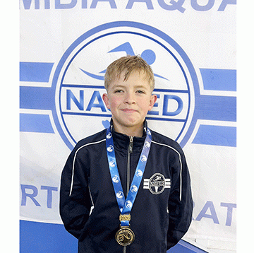 Durand strikes gold at swimming champs 