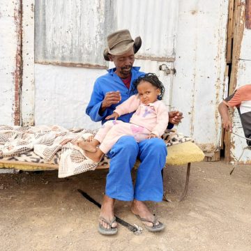 Men waiting for change in Itsawises 1 Itsawises pleads for gardening support