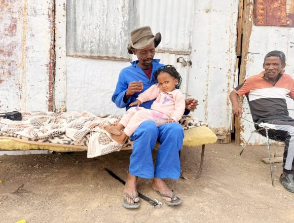 Men waiting for change in Itsawises 1 Itsawises pleads for gardening support